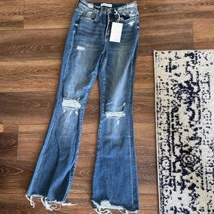 Distressed flare jeans